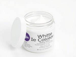 Opakowanie wybielacza Wilton z widoczną etykietą i konsystencją produktu